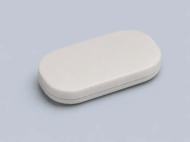 Precision zirconia wearable device housing developed as a Titanium Grade 5 replacement for electrical insulation and premium CMF